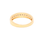 Gold ring with small diamonds on a white background