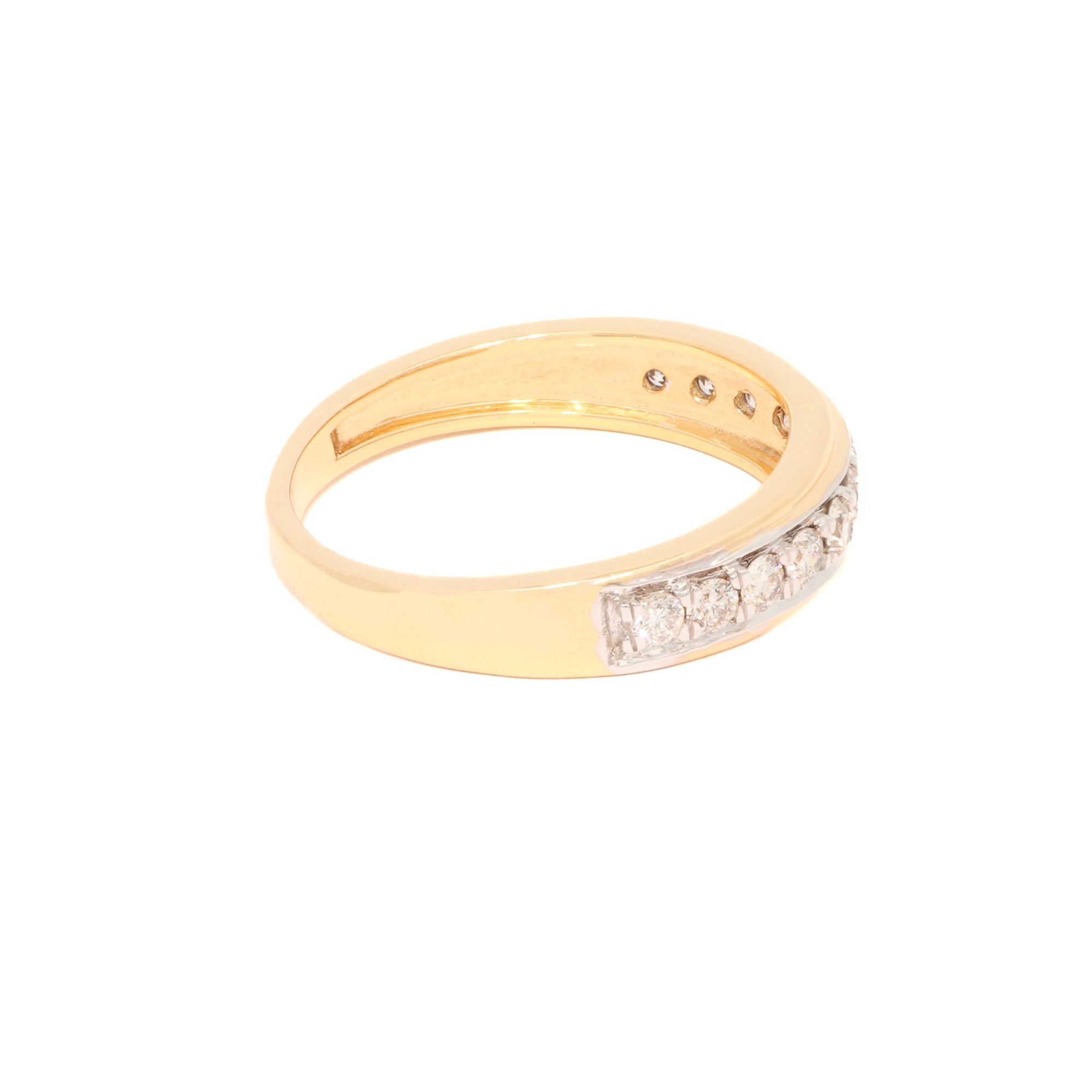 Gold ring with embedded diamonds on a white background