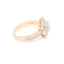 Diamond Engagement ring with a gold band on a white background
