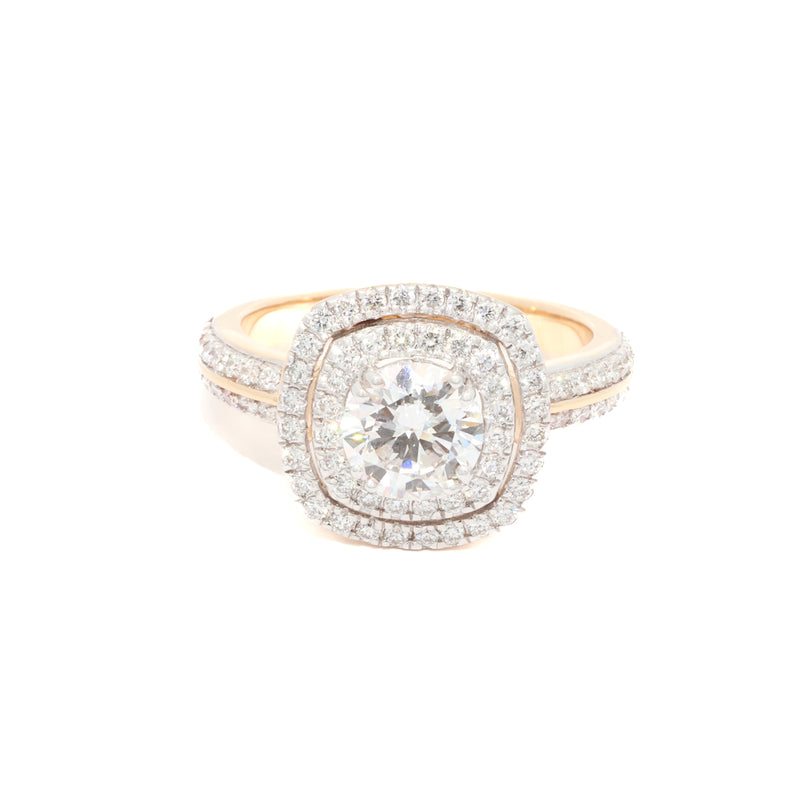 Diamond ring with a gold band on a white background