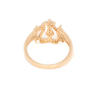 Gold ring with small diamonds on a white background