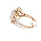 Gold ring with diamond accents on a white background