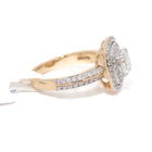 Gold and diamond ring on a white background