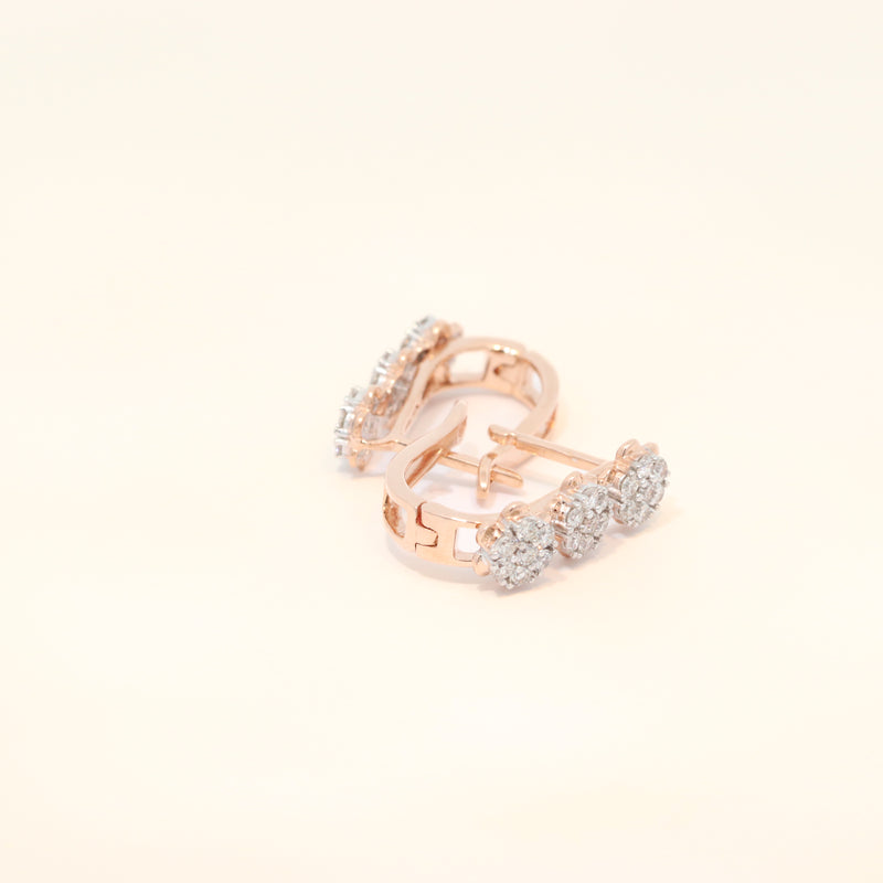Rose gold hoop huggies with natural diamonds