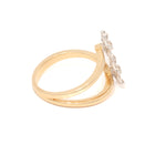 Gold ring with diamond accents on a white background