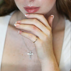 The Fleur Diamond Ring in Gold and Diamonds on Finger.