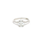 white gold ring with a diamond on a white background