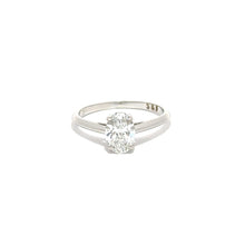 white gold ring with a diamond on a white background