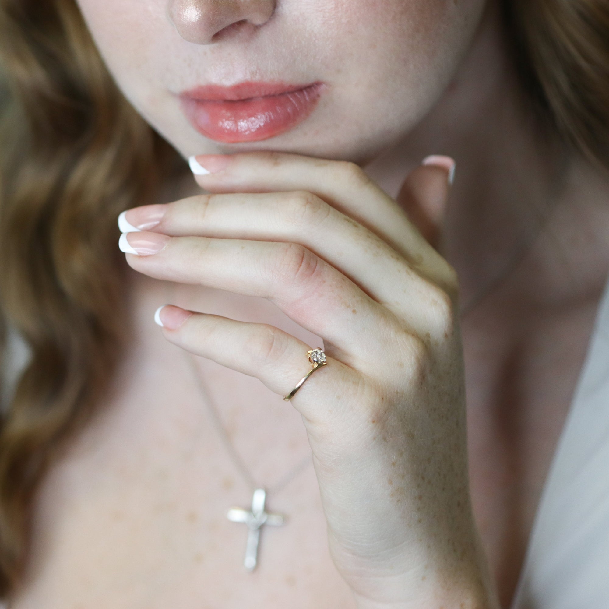 Yellow gold ring with natural diamonds on hand